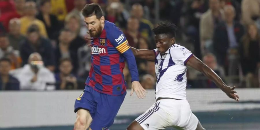 Überragender Spieler beim Barca-Sieg gegen Valladolid: Lionel Messi (l). Foto: Joan Monfort/AP/dpa