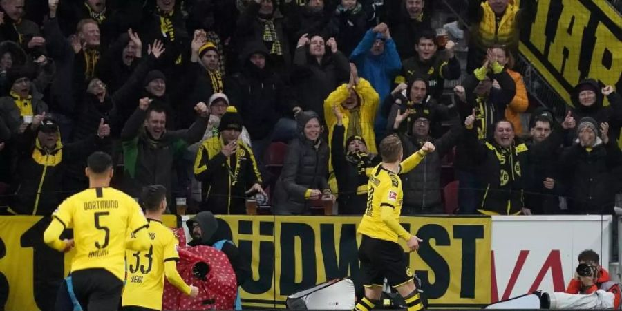 Die Dortmunder um Marco Reus (r) sind heiss auf RB Leipzig. Foto: Thomas Frey/dpa