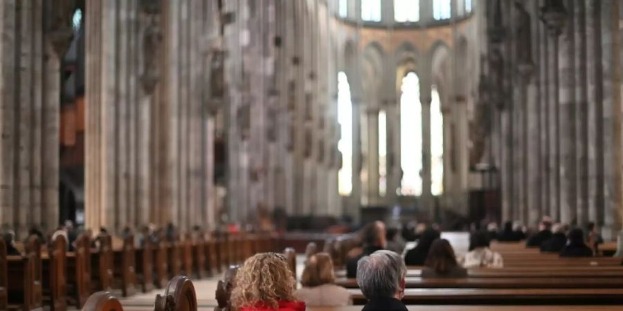 Kirchenbesucher in Köln