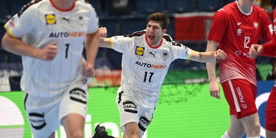 Deutschlands Lukas Zerbe feiert ein Tor gegen Polen. Foto: Marijan Murat/dpa