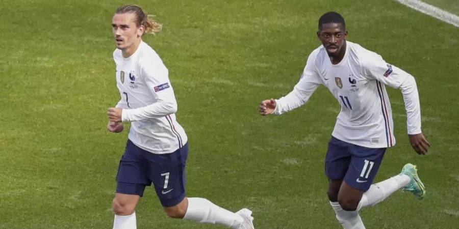 Ousmane Dembélé (r) verletzte sich im Spiel gegen Ungarn. Foto: Laszlo Balogh/Pool AP/dpa