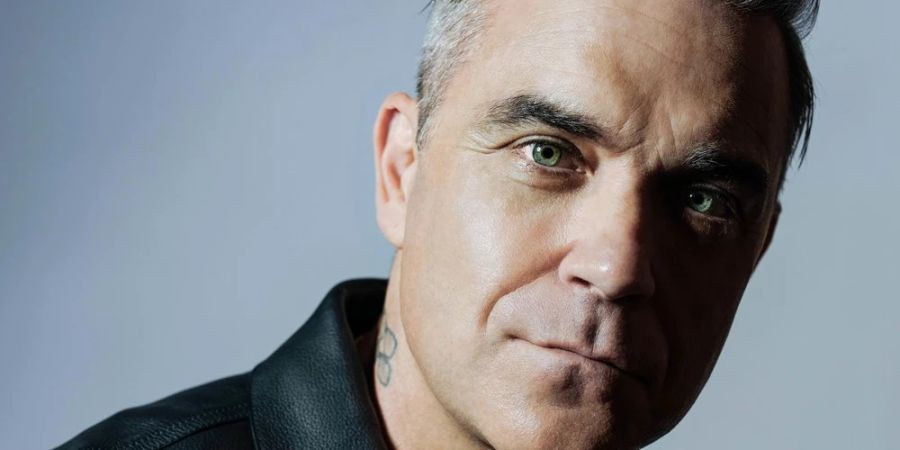 Robbie Williams blickt auf 25 Jahre Solokarriere zurück.