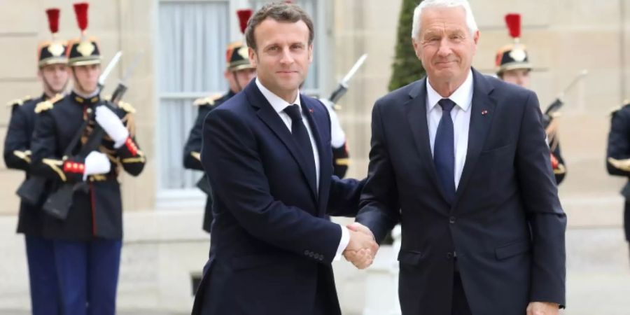 Frankreichs Präsident Macron (li.) und Europarats-Generalsekretär Jagland im Elysée-Palast