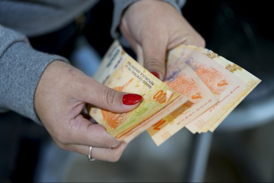 Hände Pesos Argentinien USA