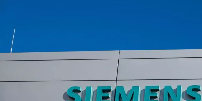 Das Logo und die Schriftzüge am neuen Hauptquartier des Medizintechnikkonzerns Siemens Healthineers. Foto: Daniel Karmann/dpa Das Logo und die Schriftzüge am neuen Hauptquartier des Medizintechnikkonzerns Siemens Healthineers. Foto: Daniel Karmann/dpa