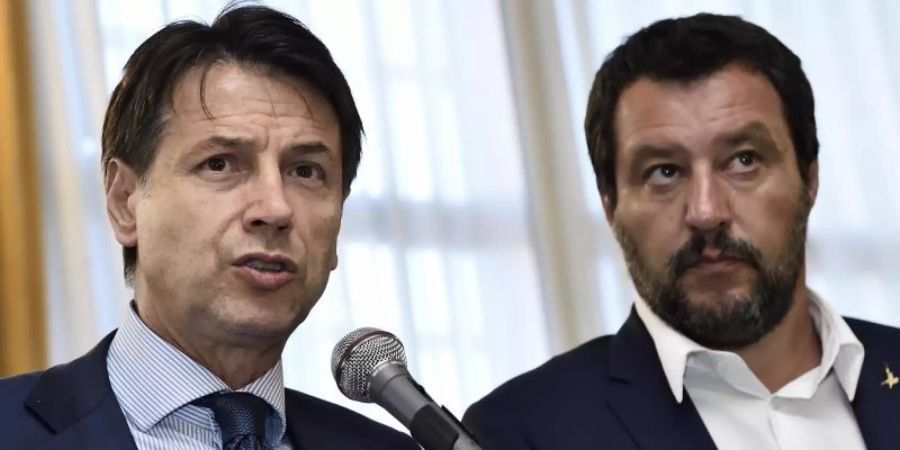 Italiens Ministerpräsident Giuseppe Conte (l) und Innebminnister Matteo Salvini in Genua. Foto: Flavio Lo Scalzo/ANSA/AP