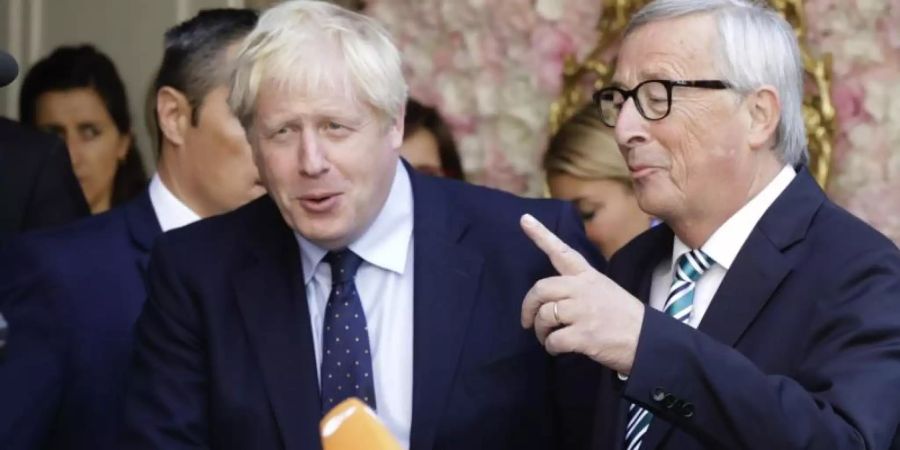 Trafen sich Anfang der Woche zu einem Gespräch: Boris Johnson (l.) und Jean-Claude Juncker. Foto: Olivier Matthys/AP