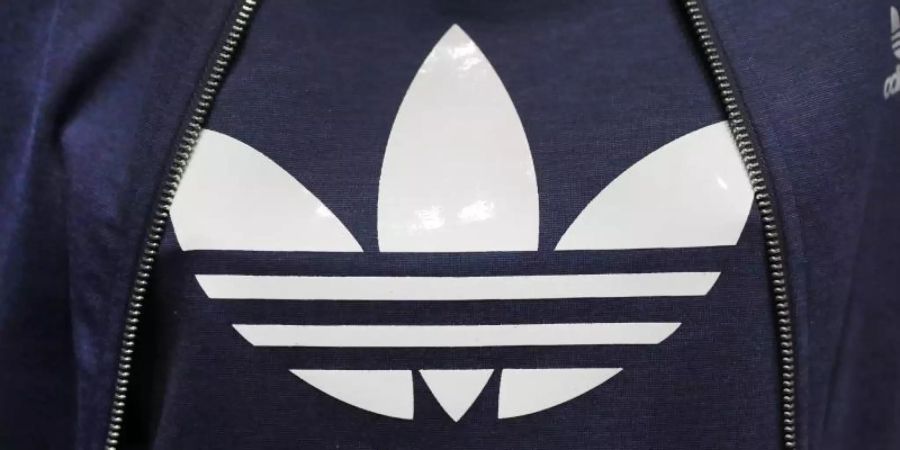 Der Sportartikelhersteller Adidas will keine Miete mehr zahlen. Foto: Daniel Karmann/dpa