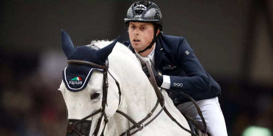 Ben Maher, Springreiter, mit seinem Pferd Explosion.