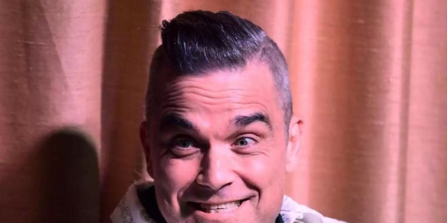 Popstar Robbie Williams hat einiges vor. Foto: Ian West/PA Wire/dpa