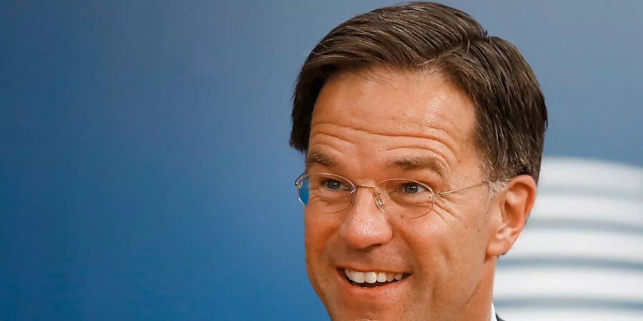 ARCHIV - Mark Rutte, Ministerpräsident der Niederlande, kommt zum EU-Gipfel in Brüssel. Der niederländische Premier ist ein Phänomen: Immer munter, immer charmant. Foto: Francois Lenoir/Reuters Pool/AP/dpa