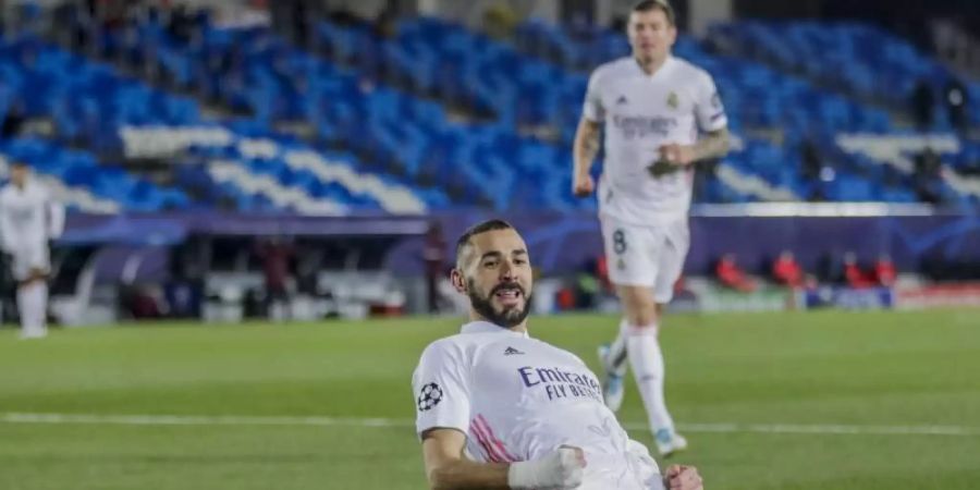 Karim Benzema vom Real Madrid feiert seinen Treffer gegen Borussia Mönchengladbach. Foto: Bernat Armangue/AP/dpa