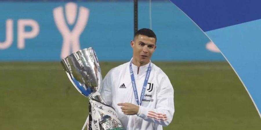 Durfte sich über den italienischen Superpokal und einen besonderen Treffer freuen: Juve-Star Cristiano Ronaldo. Foto: Antonio Calanni/AP/dpa