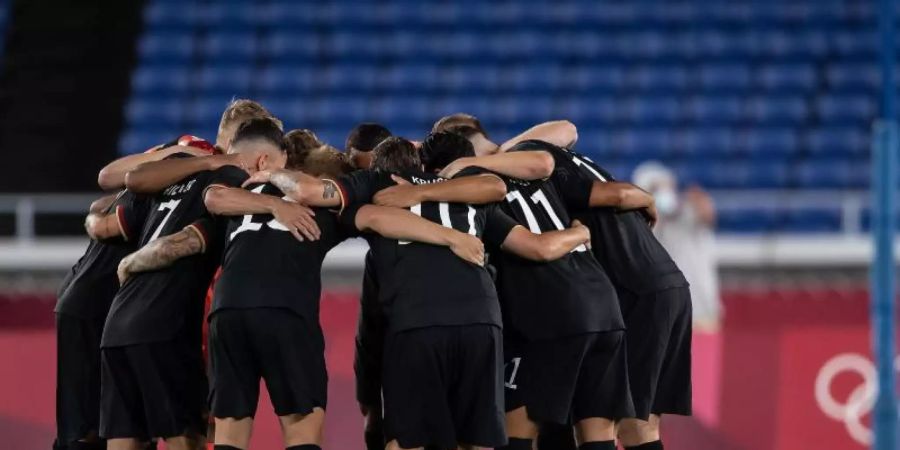 Die deutsche Mannschaft steht unter Druck. Foto: Swen Pförtner/dpa