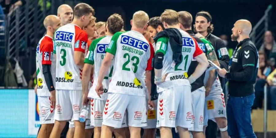 Sechs Spieler des SC Magdeburg haben sich mit dem Coronavirus infiziert. Foto: Andreas Gora/dpa/Archivbild