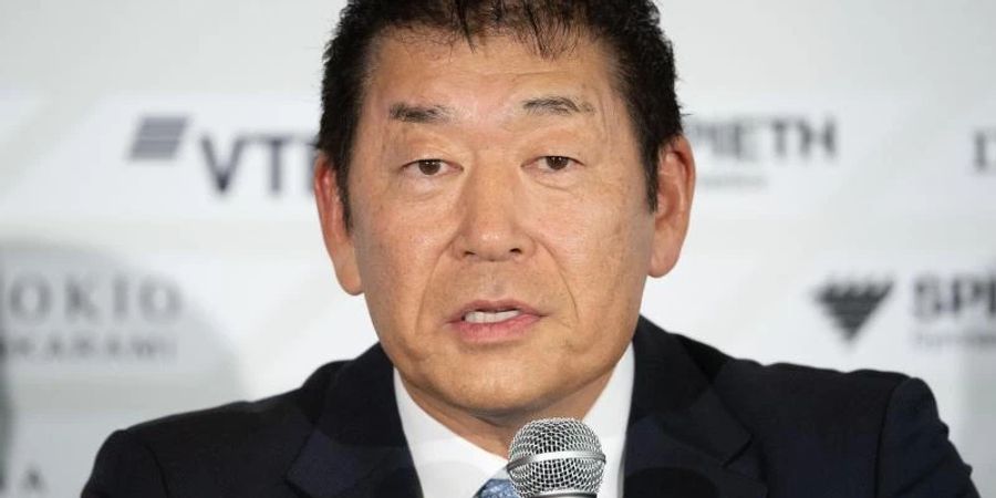 Der Präsident des Weltturnverbandes Fédération Internationale de Gymnastique (FIG), Morinari Watanabe, nimmt an einer Pressekonferenz teil. Foto: Marijan Murat/dpa