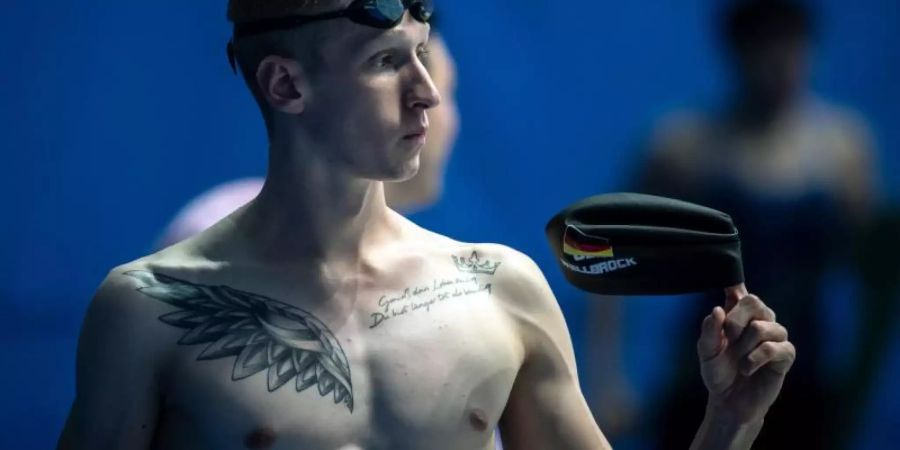 Florian Wellbrock nimmt am Training im Wettkampfbecken teil. Foto: Bernd Thissen