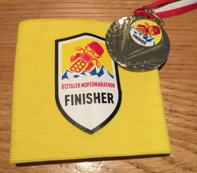 Finisher Auszeichnung des Ötztaler Mopedmarathons. Sekuropfer Böju