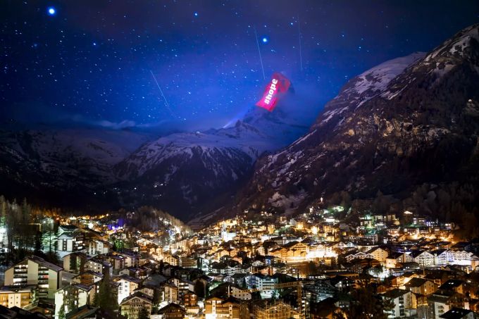 The iconic Matterhorn mountain is illuminated by Swiss light artist Gerry Hofstetter aiming to send messages of hope, support and solidarity to the ones sufferings from the global coronavirus disease, COVID-19, pandemic in the alpine resort of Zermatt, Switzerland, Thursday, March 26, 2020. The new coronavirus causes mild or moderate symptoms for most people, but for some, especially older adults and people with existing health problems, it can cause more severe illness or death. (Valentin Flauraud/Keystone via AP) APTOPIX Virus Outbreak Switzerland