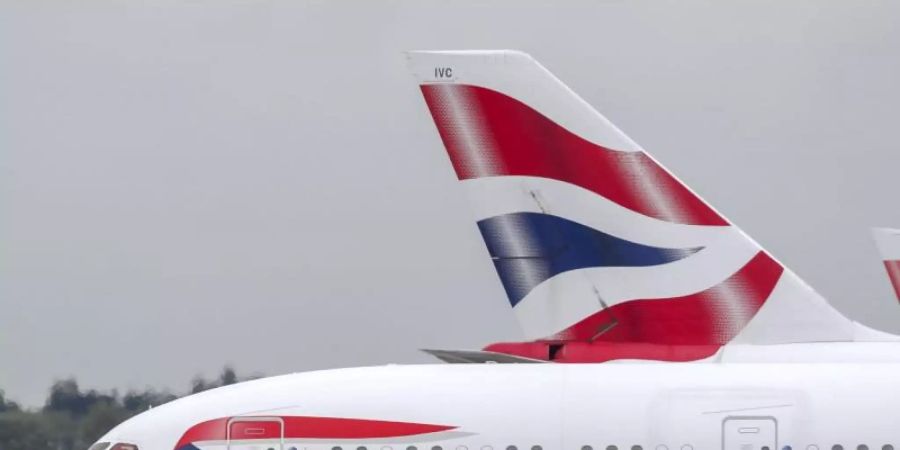 Maschinen von British Airways am Flughafen Heathrow. Foto: PA Wire/dpa