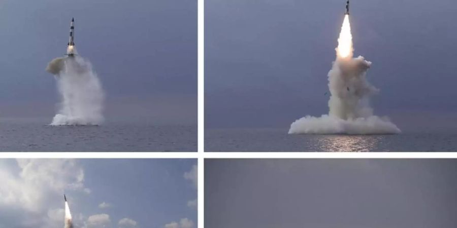 Diese Kombination von vier Fotos, die von der nordkoreanischen Regierung zur Verfügung gestellt wurden, zeigt eine ballistische Rakete, die in Nordkorea von einem U-Boot aus gestartet wurde. Foto: ---/KCNA via KNS via AP /dpa