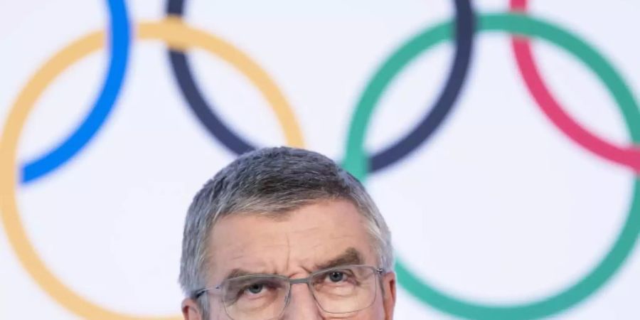 Thomas Bach ist der Präsident des Internationalen Olympischen Komitees (IOC). Foto: Jean-Christophe Bott/KEYSTONE/dpa