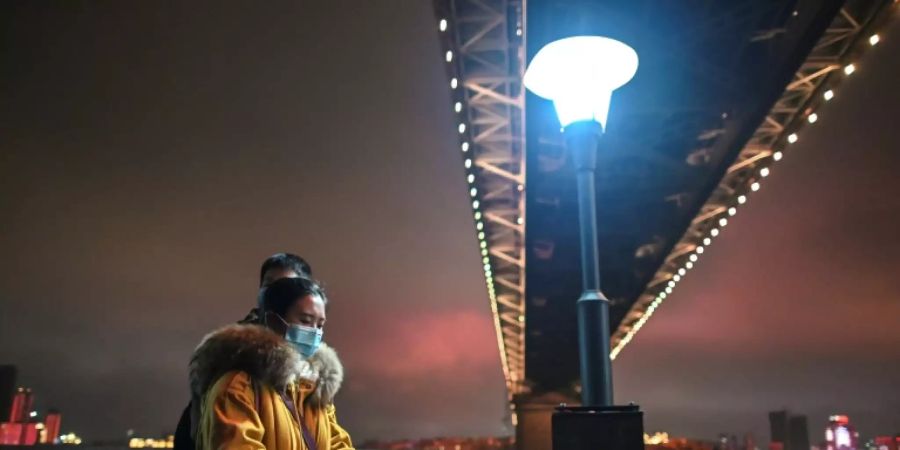 Maskenträger in Wuhan