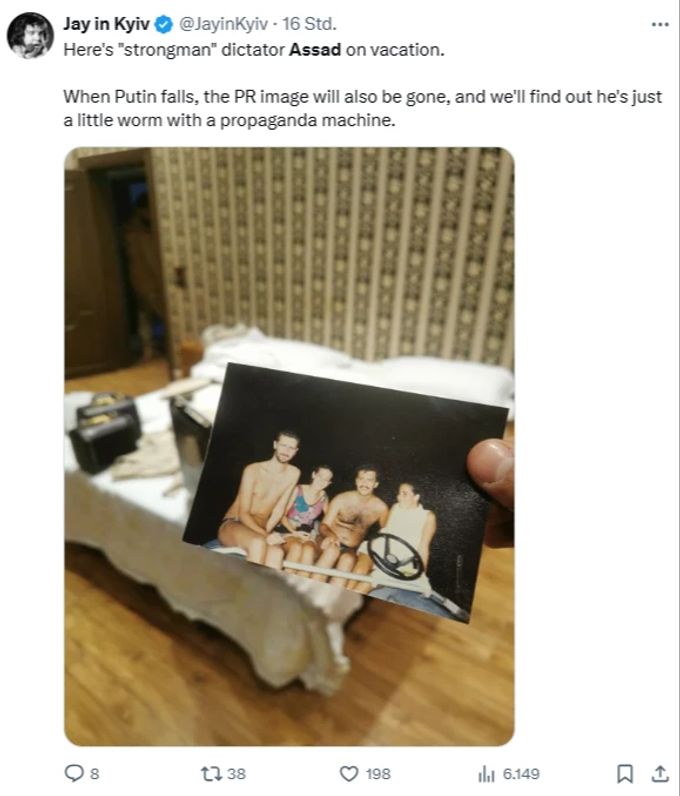 Die Rebellen teilen ein privates Foto von Diktator Assad. foto rebellen assad
