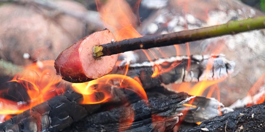 Wurst Feuer grillen Stock