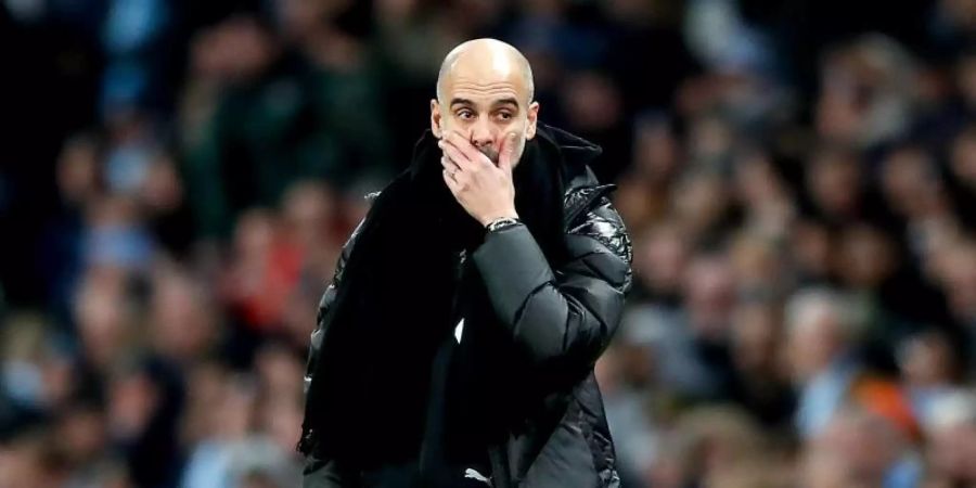 Glaubt nicht mehr an den Meister-Titel: Manchester Citys Coach Pep Guardiola. Foto: Martin Rickett/PA Wire/dpa