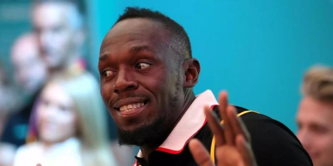 Gibt sich in Tokio die Ehre: Ex-Sprint-Star Usain Bolt. Foto: Danny Lawson/PA Wire/dpa Gibt sich in Tokio die Ehre: Ex-Sprint-Star Usain Bolt. Foto: Danny Lawson/PA Wire/dpa
