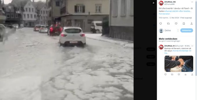 Überschwemmte Strasse durch das Unwetter in Flawil SG. überschwemmte Strasse
