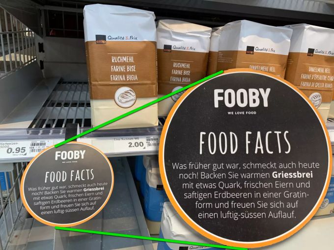 Ein Regalstecker wirbt für Griess vor einem leeren Regalfach für Hartweizengriess in einer Coop-Filiale. Fooby Hartweizengriess