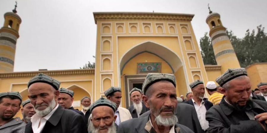 Uiguren in Kashgar im Nordwesten Chinas. Foto: How Hwee Young/EPA/dpa