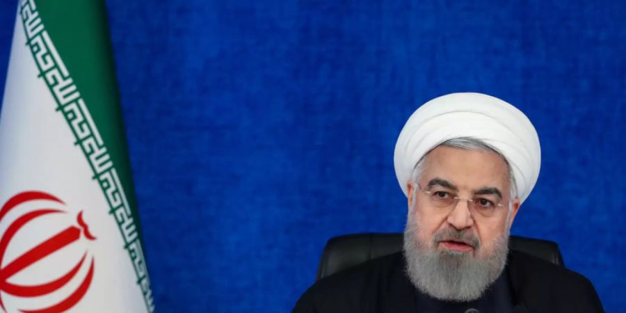 HANDOUT - Der iranische Präsident Hassan Ruhani. Foto: Ebrahim Seydi/Iranian Presidency/dpa - ACHTUNG: Nur zur redaktionellen Verwendung im Zusammenhang mit der aktuellen Berichterstattung und nur mit vollständiger Nennung des vorstehenden Credits