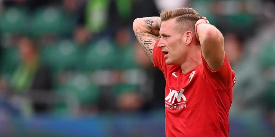 Augsburgs André Hahn ist positiv auf das Coronavirus getestet worden und fehlt dem FC Augsburg. Foto: Swen Pförtner/dpa