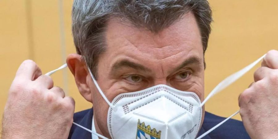 Markus Söder spricht sich für einen «kompletten Lockdown» von Weihnachten bis zum 10. Januar aus. Foto: Peter Kneffel/dpa