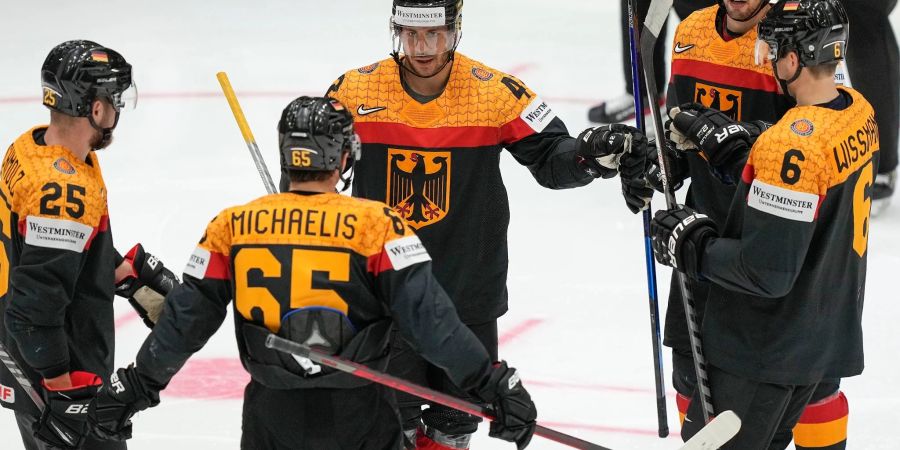 Deutschlands Eishockey-Cracks haben den Viertelfinaleizug bereits sicher.