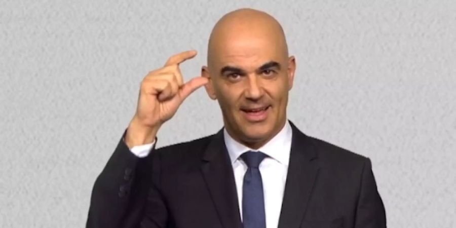 Bundespräsident Alain Berset zeigt seine Gebärde.