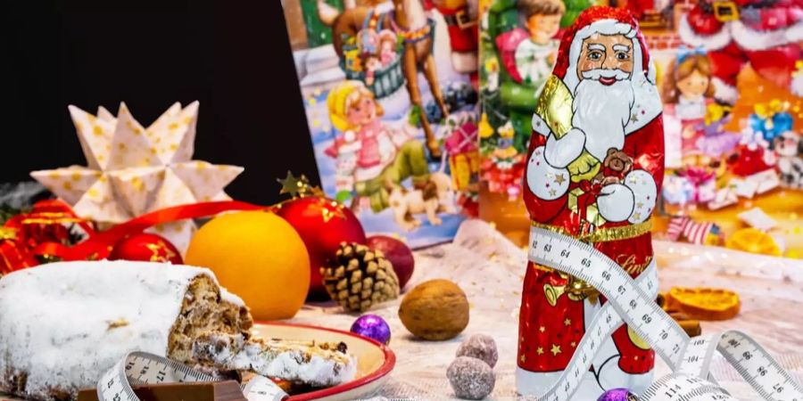 Hilfe in der Plätzchenzeit: Britische Forscher zeigen, wie an Weihnachten unnötige Kilos vermieden werden können.