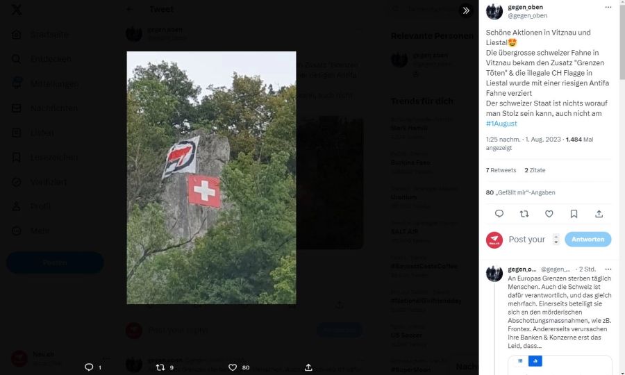 Neben der Schweizer Flagge in Liestal BL hängt eine Fahne der Antifa.