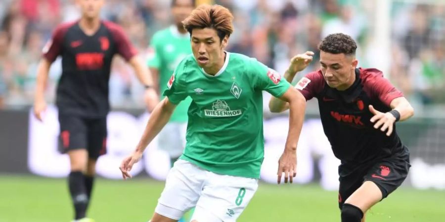 Fällt wahrscheinlich für sechs Wochen aus: Yuya Osako (l). Foto: Carmen Jaspersen