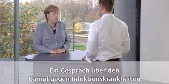Merkel in ihrem Video Podcast, hier zum Thema Infektionskrankheiten. Merkel in ihrem Video Podcast, hier zum Thema Infektionskrankheiten.