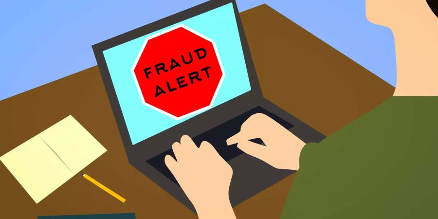 Auf einem gezeichneten Laptop steht «Fraud Alert» (Deutsch: Betrugsalarm).