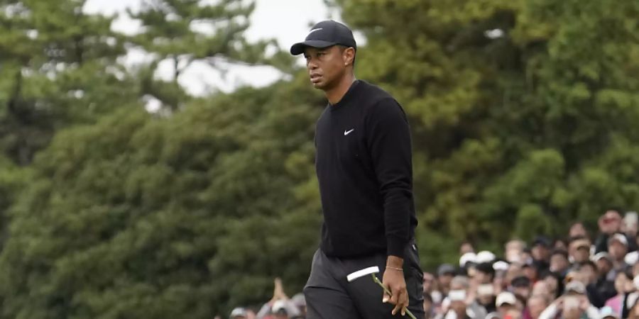 Auch im fernen Japan schart Tiger Woods Tausende von Fans um sich