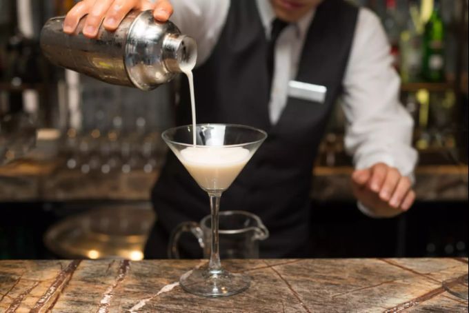 Mit etwas Rum, Clementinensaft und etwas Ahornsirup schmeckt der Winter Cocktail lecker. Cocktail