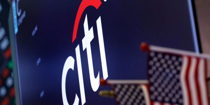 Das Logo der Citigroup über einem Handelsposten auf dem Parkett der New York Stock Exchange. citigroup