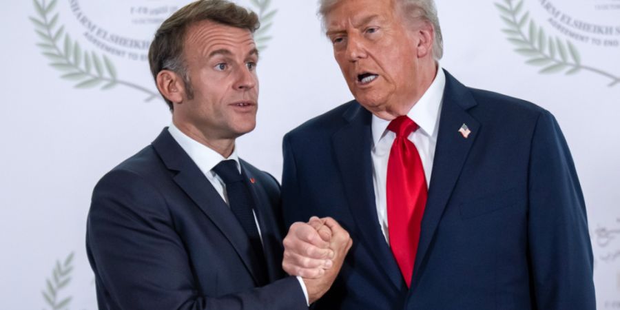 ARCHIV - US-Präsident Donald Trump und Emmanuel Macron, Präsident von Frankreich. Foto: Michael Kappeler/dpa