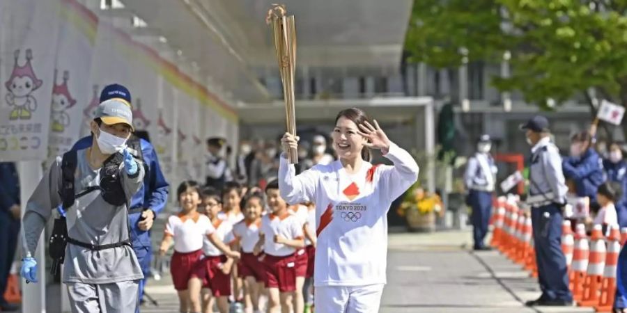 Der Olympischen Fackellauf wird nicht durch die Region Osaka führen. Foto: -/Kyodo/dpa