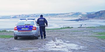 Polizist Polizeiwagen Strand Ärmelkanal